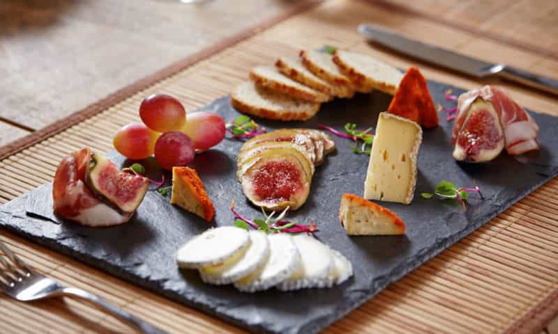 a great selection of cheeses with figs