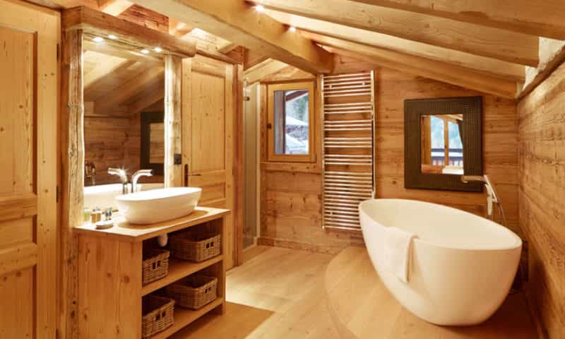 beautiful bathroom for after day of skiing on slopes in luxury ski chalet