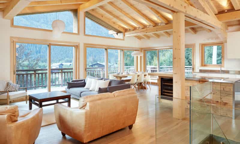 an elegant living room with mountain views