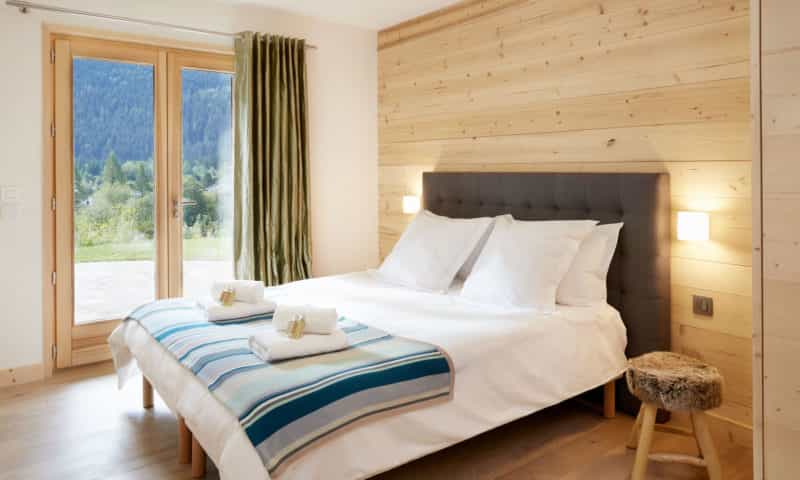 an elegant bedroom in a chalet