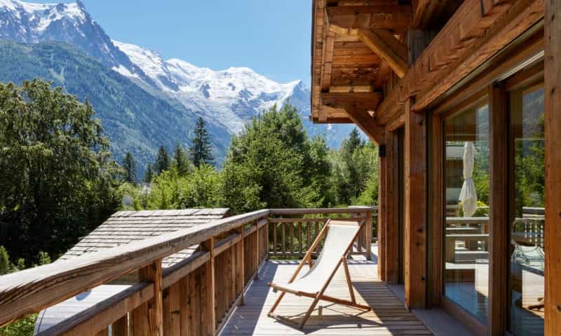 the balcony of a ski chalet