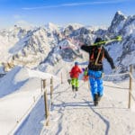 Image of a family skiing