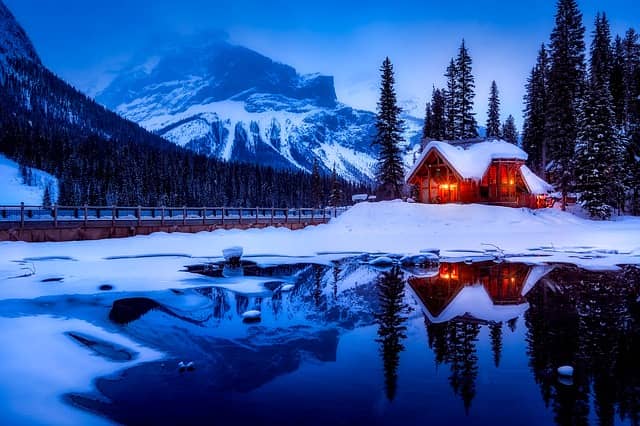 image of a cabin in snow