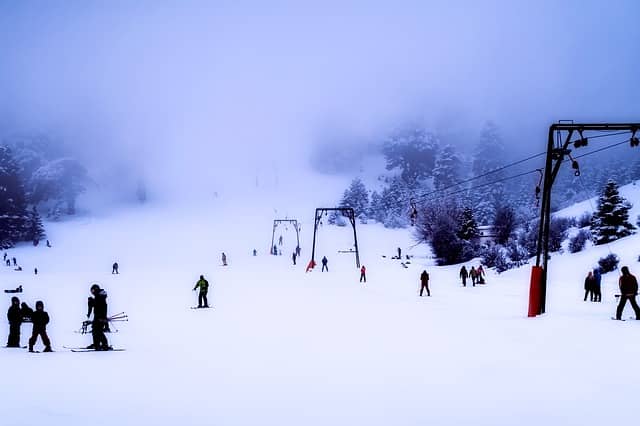 snowy slopes where people are skiing