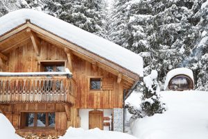 picture of chalet in chamonix under snow